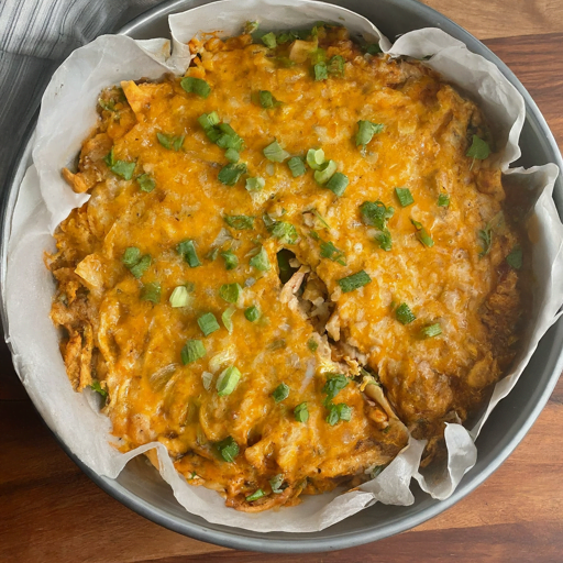 A protein-packed, low-carb friendly chicken pie made with a unique shredded tortilla crust, perfect for a healthy and satisfying meal.