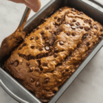 Enjoy a quick and easy gluten-free breakfast or protein-packed snack with this flavorful banana chocolate oat bread.